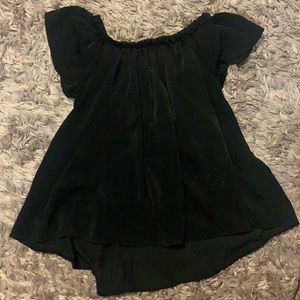 Black off the shoulder women’s top.